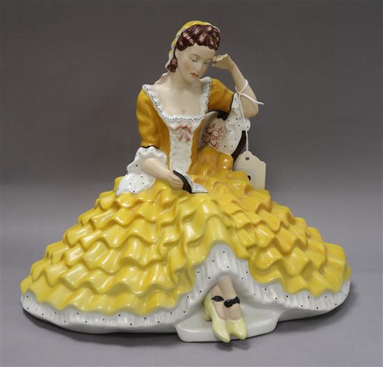 A Royal Dux figure of lady in a yellow dress (17543) height 26cm